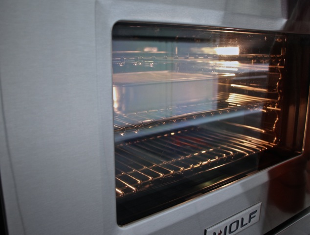 cheesecake baking in oven