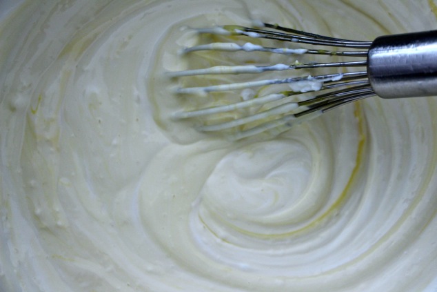 mixing the yolks and cheese mixture