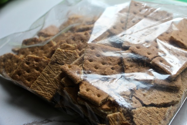 breaking graham crackers in sealed bag