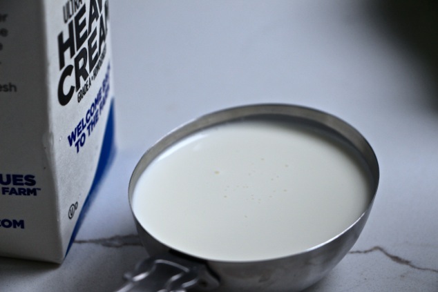 heavy cream in measuring cup