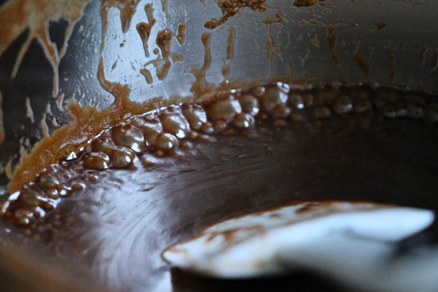 small bubbles on side of saucepan close up