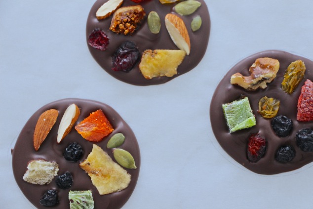 three chocolate dried fruit circles