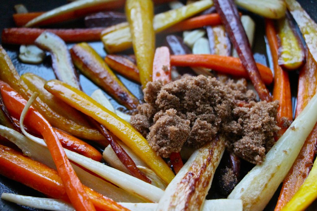 colorful carrots and brown sugar close up
