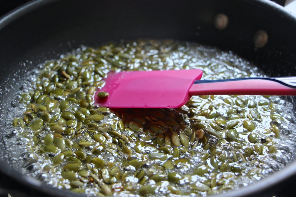 mixing seeds into sugar syrup