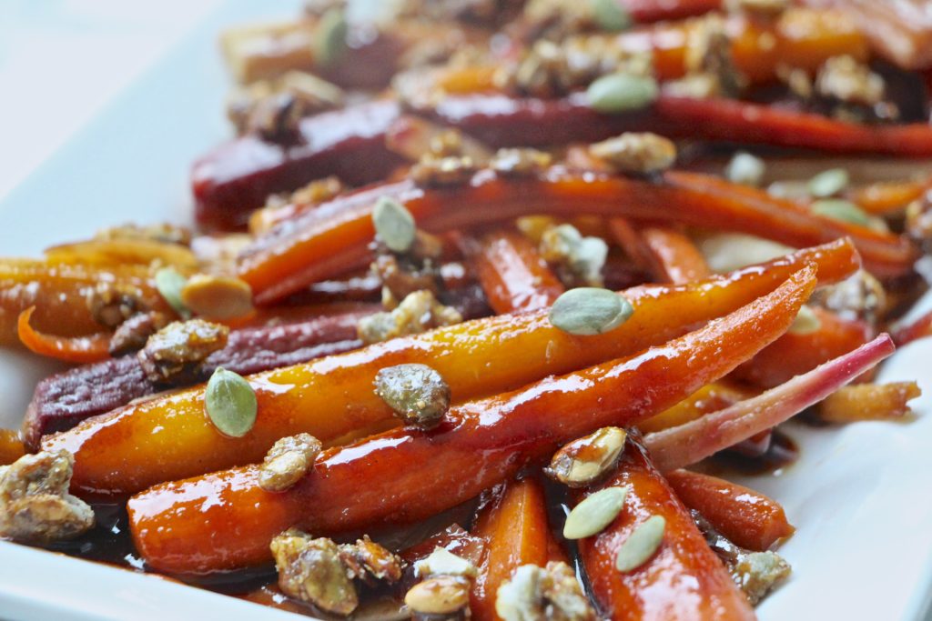 plating glazed carrots close up