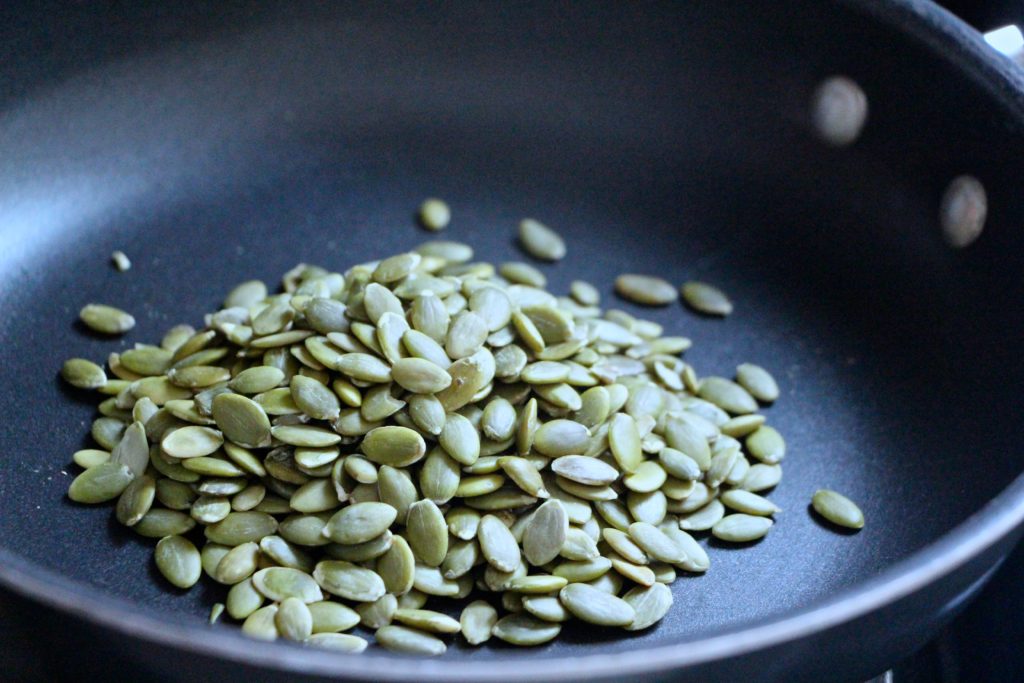 pumpkin seeds in pan