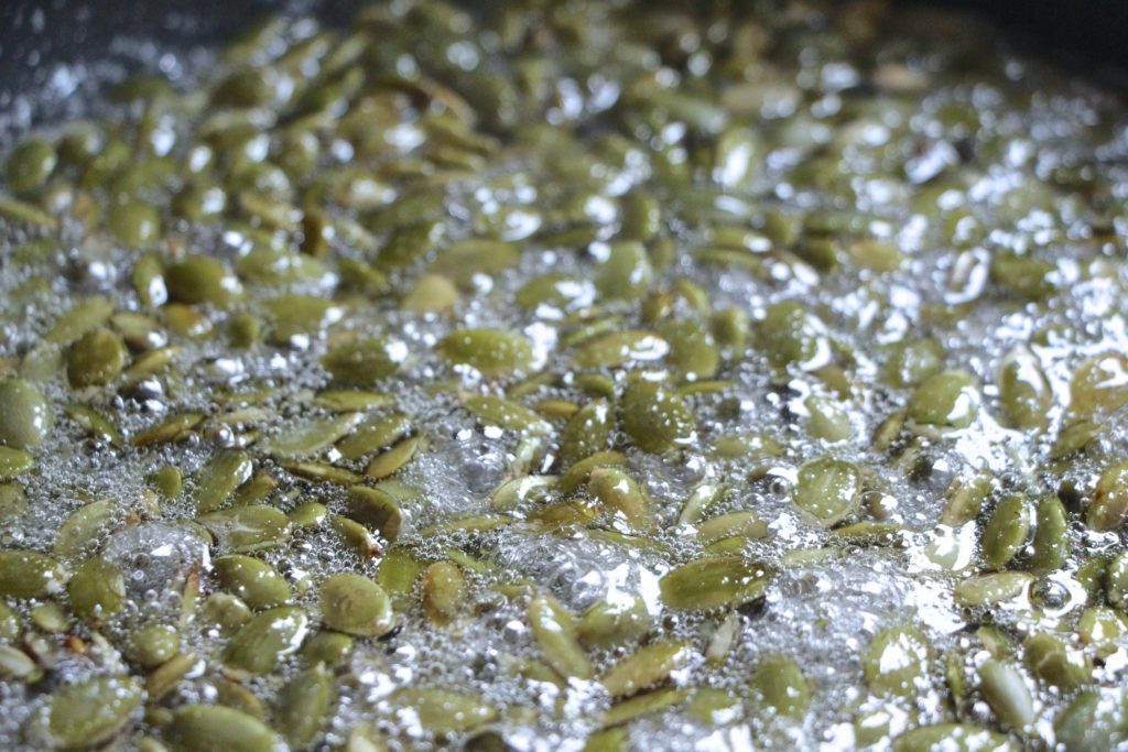 pumpkin seeds in sugar syrup close up